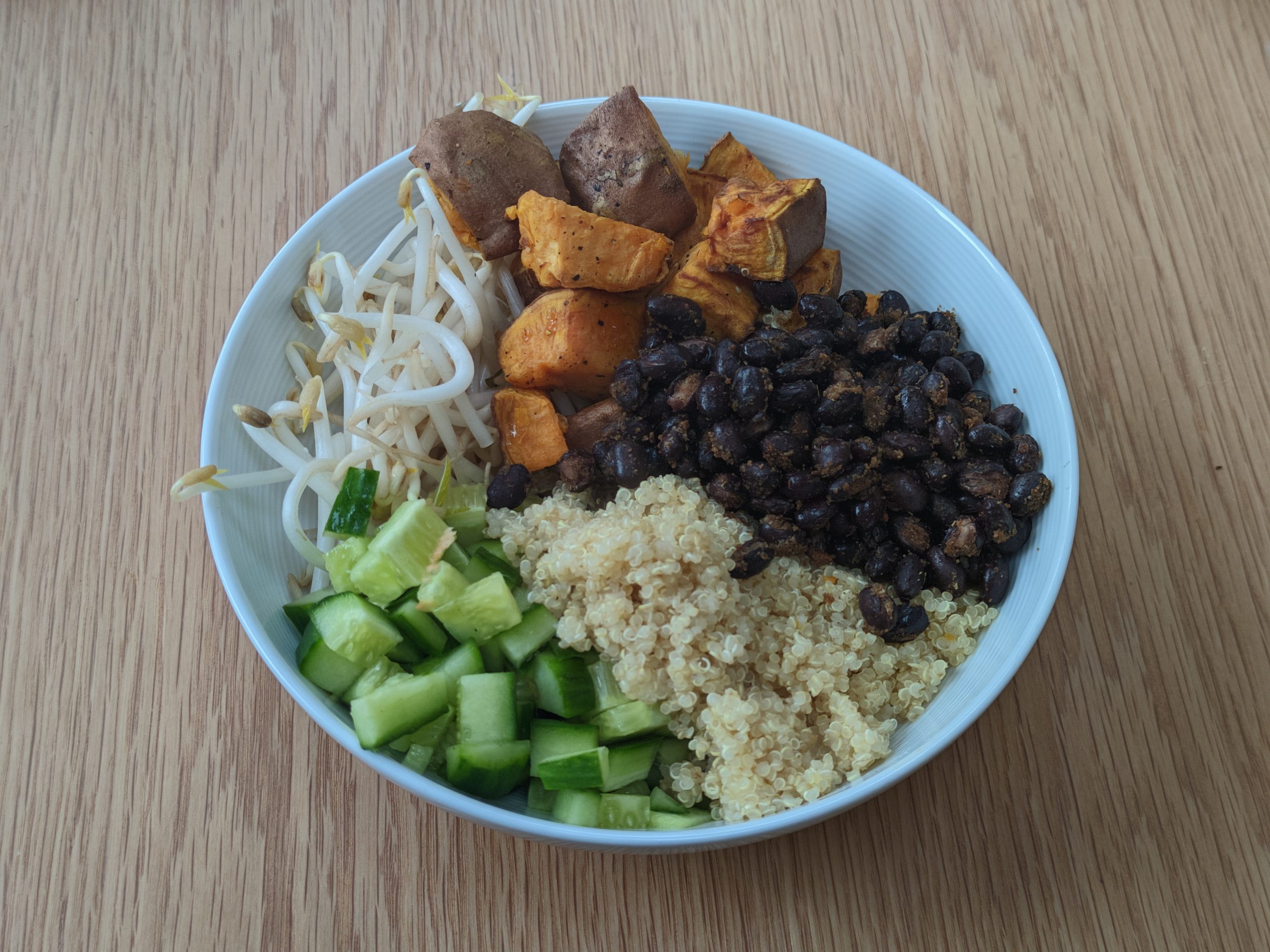 Quinoa bowl with peanut sauce